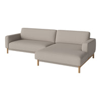 Light beige modern sectional sofa with a minimalist design and wooden legs, perfect for contemporary decor.