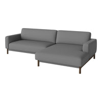 Gray modern sectional sofa with clean lines and a minimalist design, perfect for contemporary living spaces.