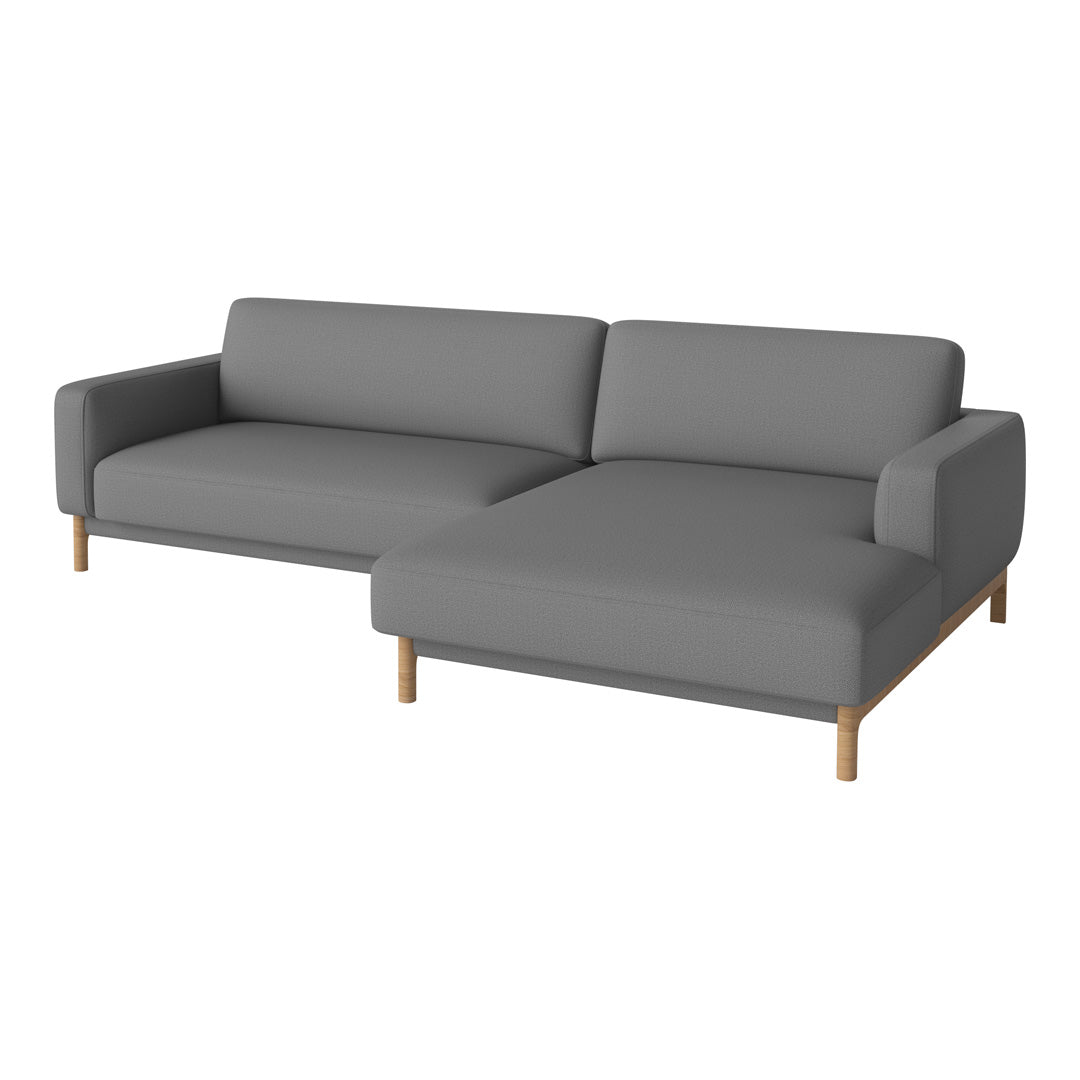 Gray modular sofa with clean lines and wooden legs, featuring a smooth, solid fabric upholstery. 