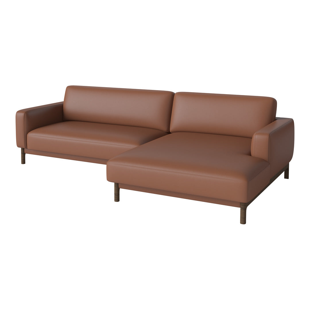 Brown leather sectional sofa with smooth, sleek design and minimalistic style. Perfect for modern interiors.