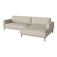 Cream-colored modern sectional sofa with simple lines and natural wood legs, perfect for minimalist decor.