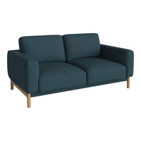 Teal fabric sofa with a smooth texture and minimalist design, featuring a natural wood base for a modern look.