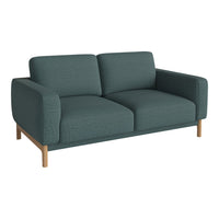 Teal textured fabric sofa with minimalist design and natural wood legs, perfect for modern interiors.