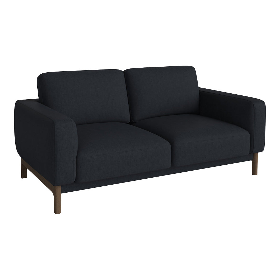 Modern dark grey sofa with a sleek, minimalistic design and smooth upholstery, featuring wooden legs.