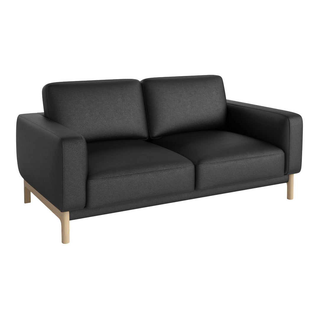 Black upholstered sofa with a minimalist design and light wooden legs. Simple and modern aesthetic for any living space.