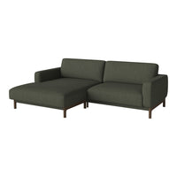Dark green fabric corner sofa with a modern design and clean lines, featuring subtle texture and wooden legs.