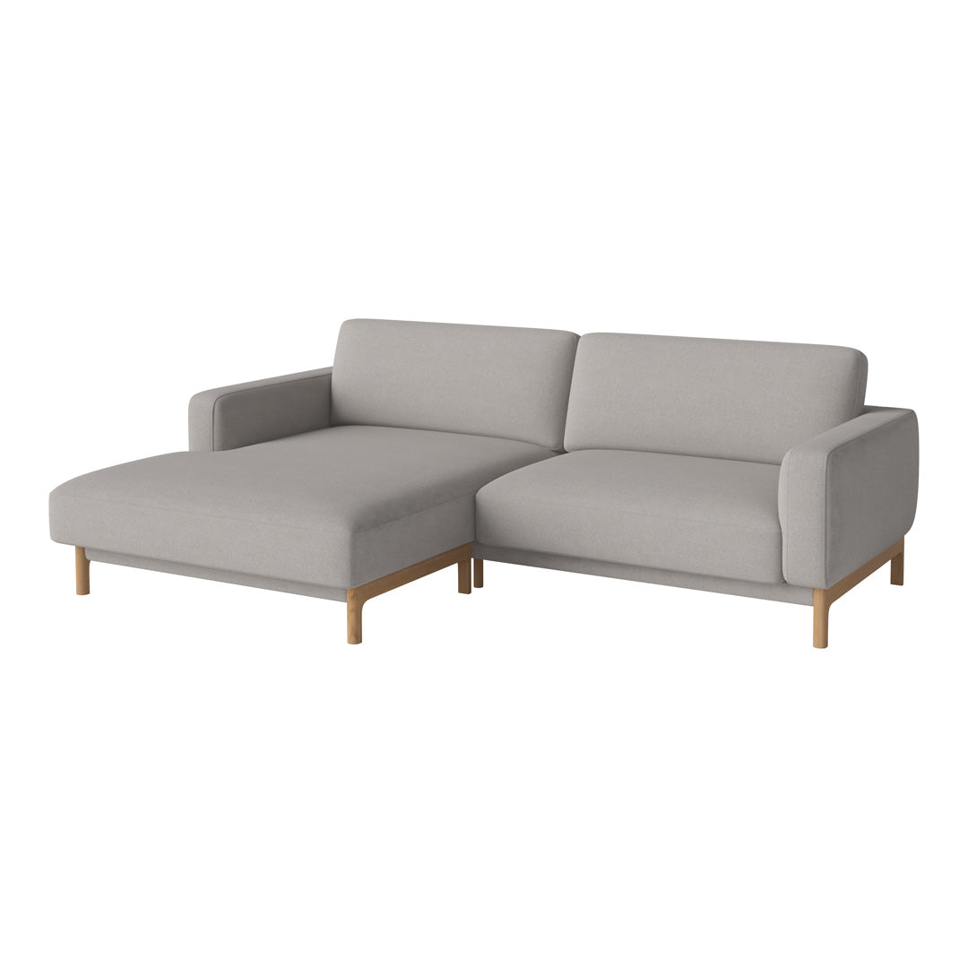 Light gray fabric sectional sofa with clean lines and natural wood legs, perfect for modern decor.