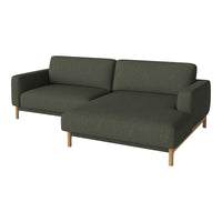 Dark green fabric sofa with a minimalist design and light wooden legs, perfect for modern interiors.