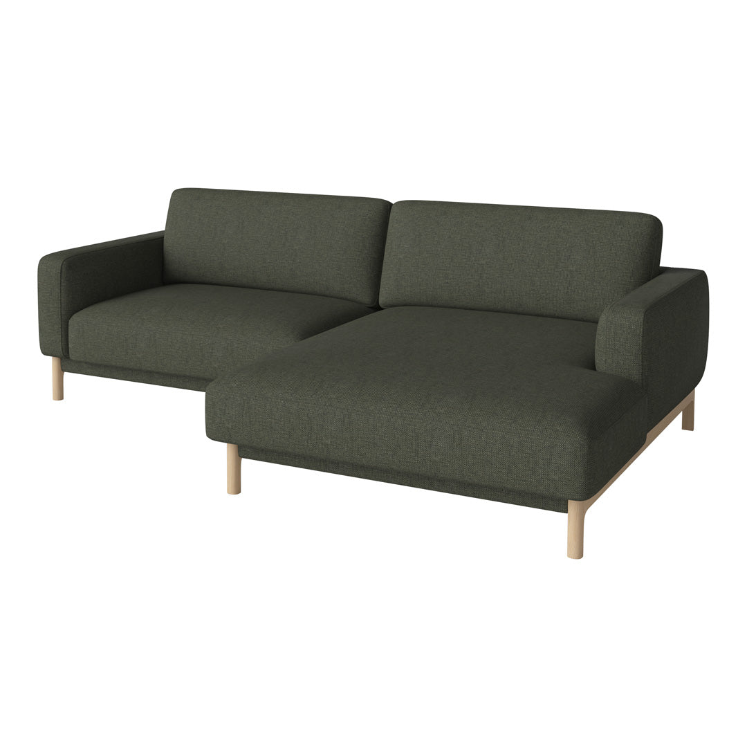 Green fabric sectional sofa with smooth texture and natural wooden legs. Perfect for modern living spaces.