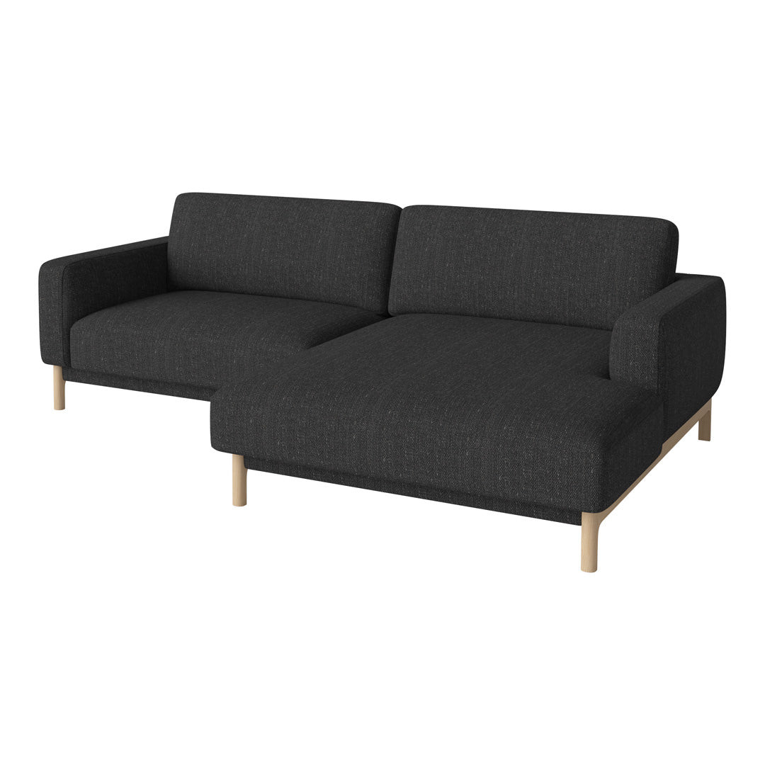 Charcoal gray fabric sofa with minimalist design and natural wood legs. Ideal for modern living spaces.