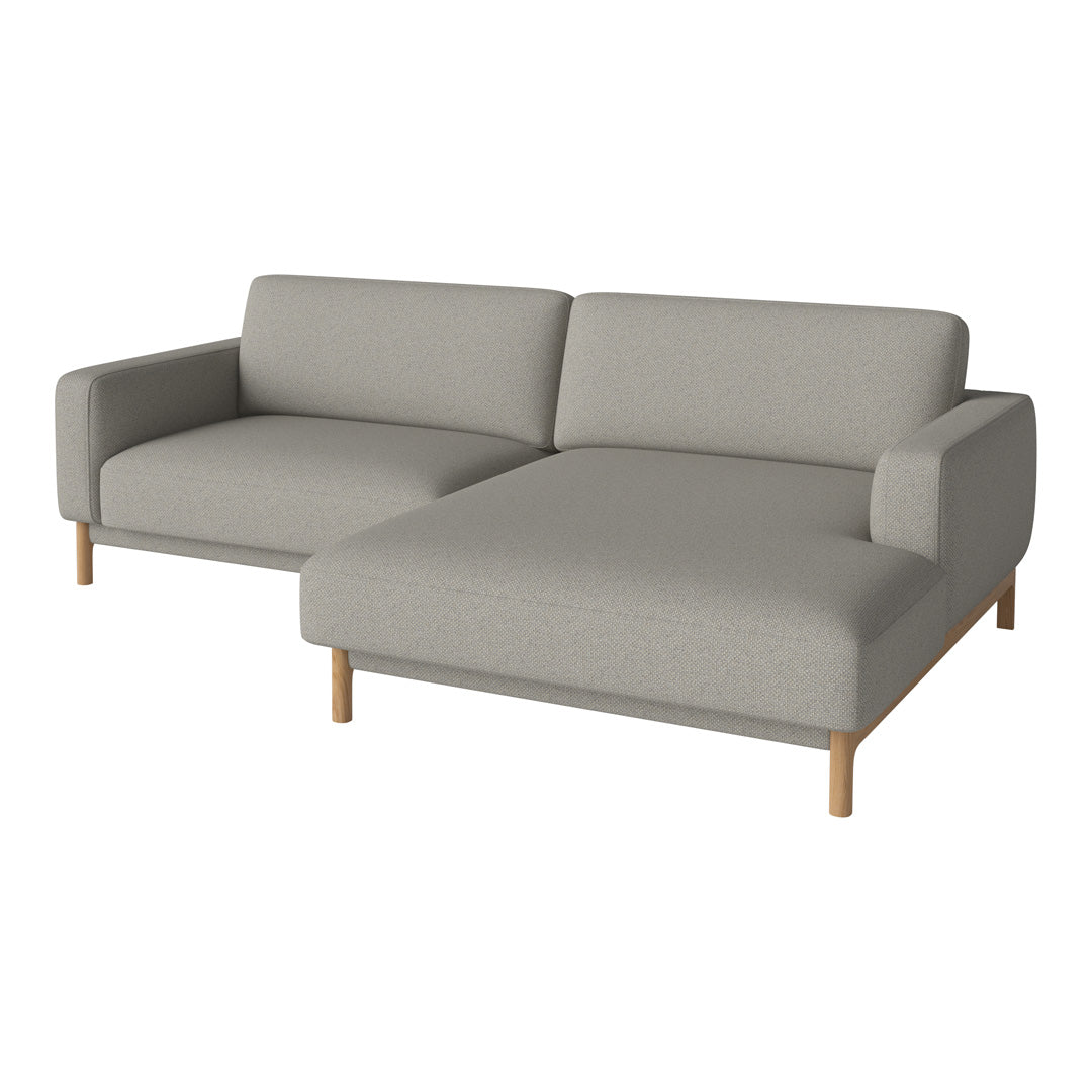 Light gray fabric sectional sofa with clean lines and wooden legs, offering a modern, minimalist aesthetic.