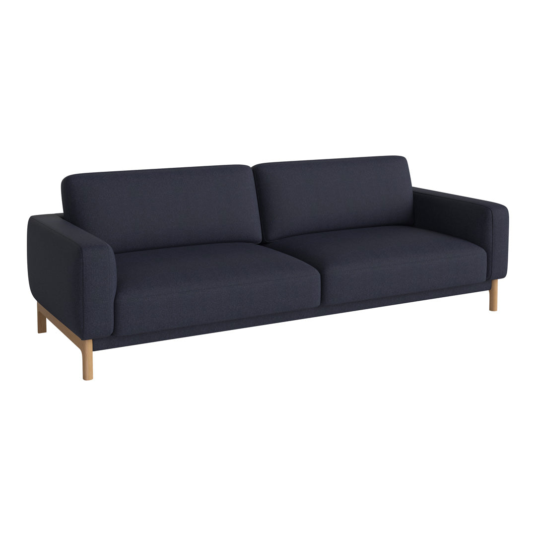 Modern navy blue sofa with clean lines and a simple design, featuring a solid fabric and light wooden legs.