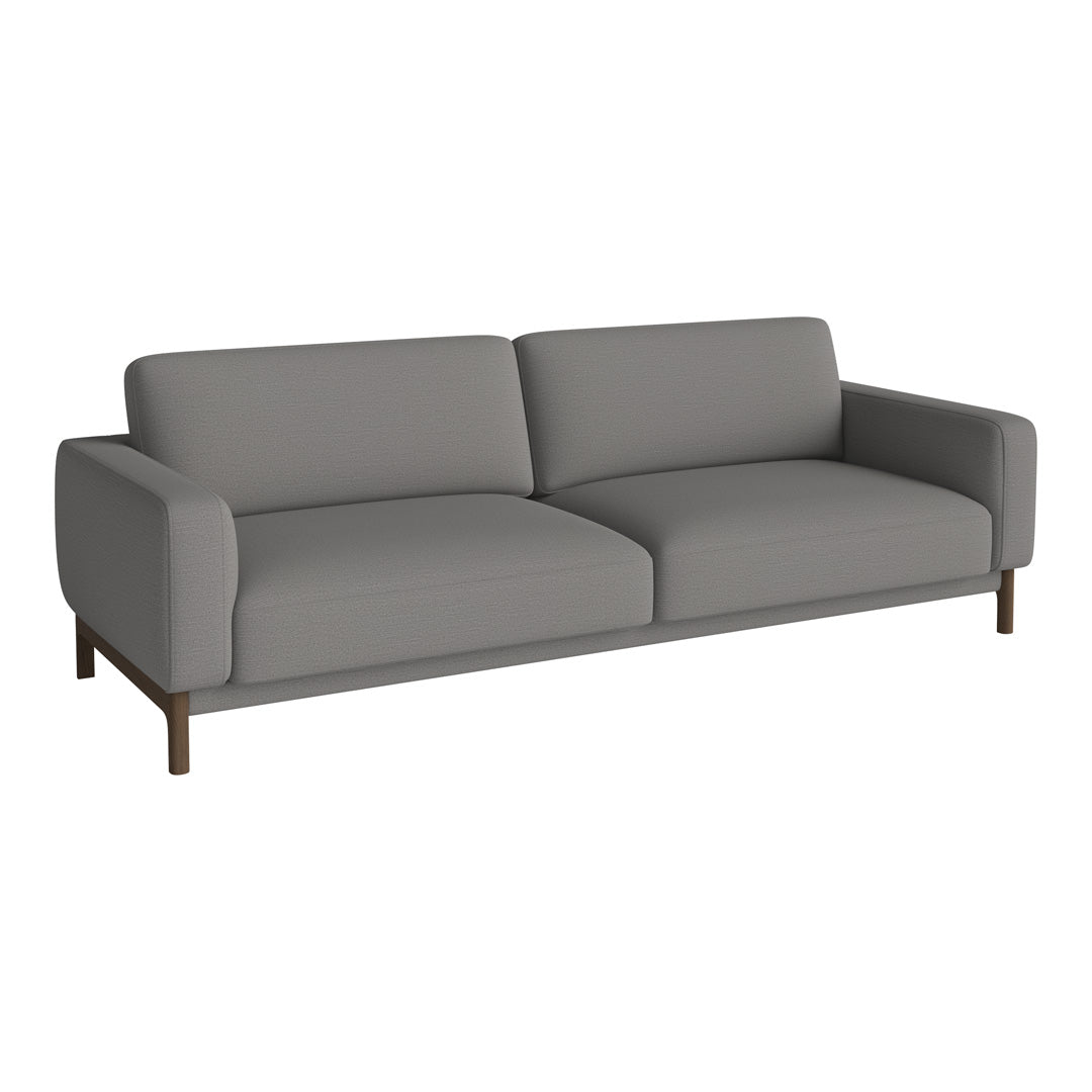 Modern grey sofa with sleek lines and minimalistic design, featuring a smooth fabric and wooden legs.