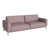 Light pink modern sofa with smooth fabric and simple, clean lines. Wooden legs add a touch of elegance.