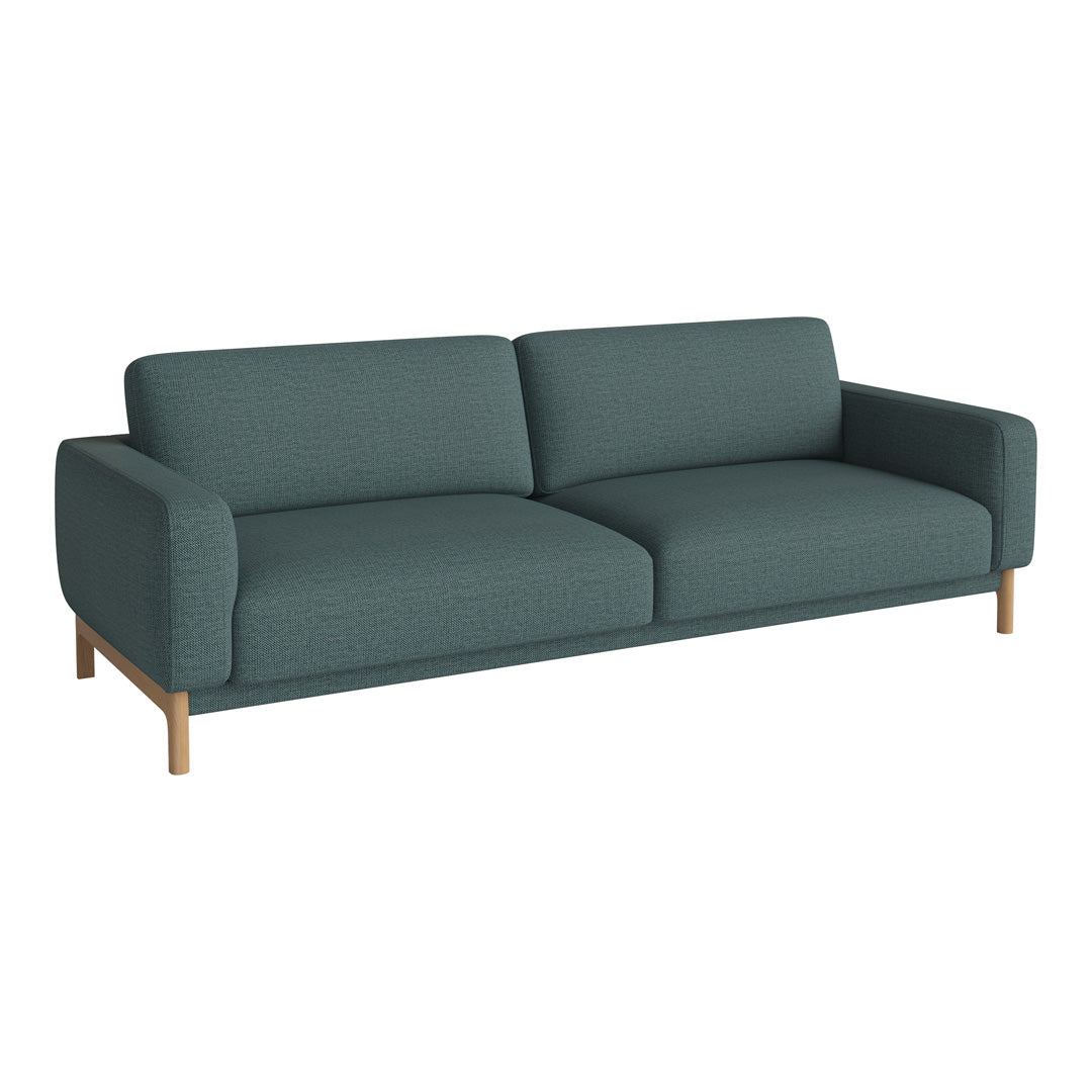 Teal fabric sofa with a modern design and light wooden legs, featuring a smooth texture and minimalist style.