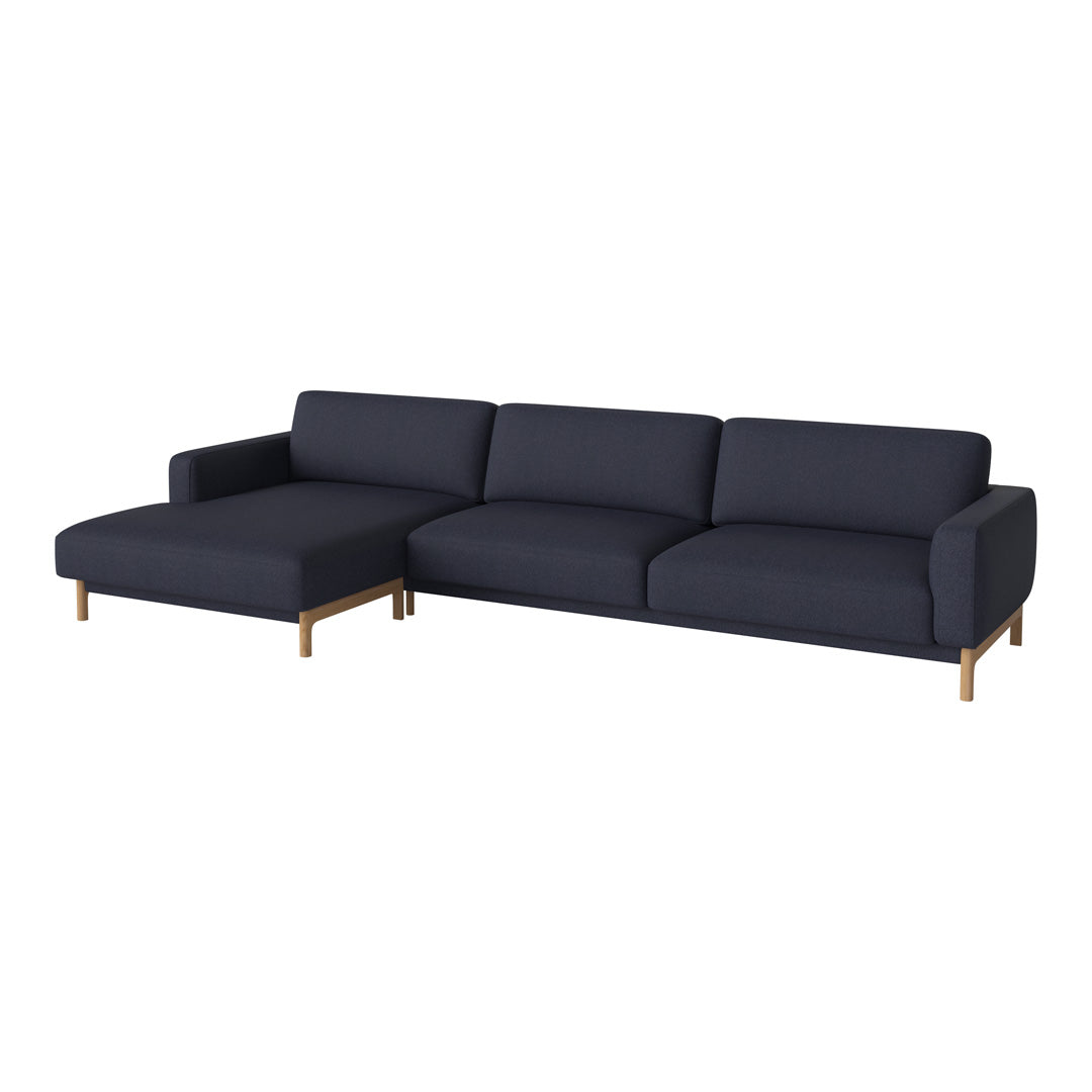 Navy blue sectional sofa with a modern design and solid wooden legs, perfect for stylish living spaces.