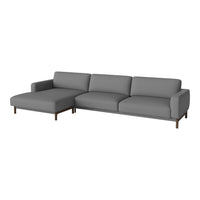 Gray sectional sofa with a modern design and smooth fabric upholstery, featuring clean lines and wooden legs.