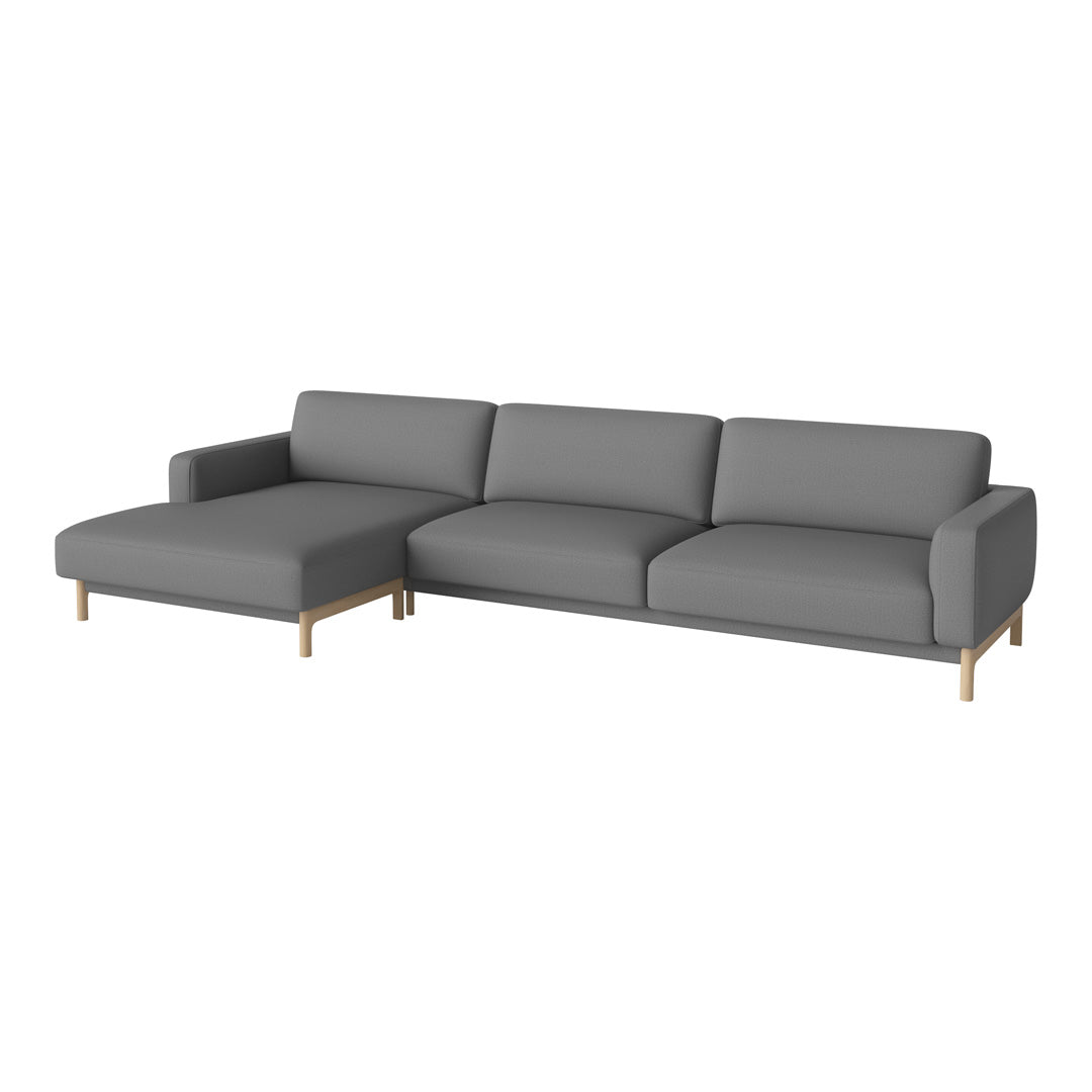 Modern grey sectional sofa with clean lines and wooden legs, featuring a sleek, minimalist design. Perfect for any decor.