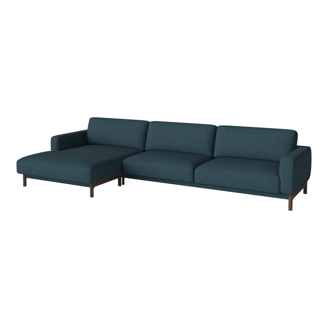 Teal sectional sofa with a contemporary design and smooth fabric, featuring a minimalistic silhouette.