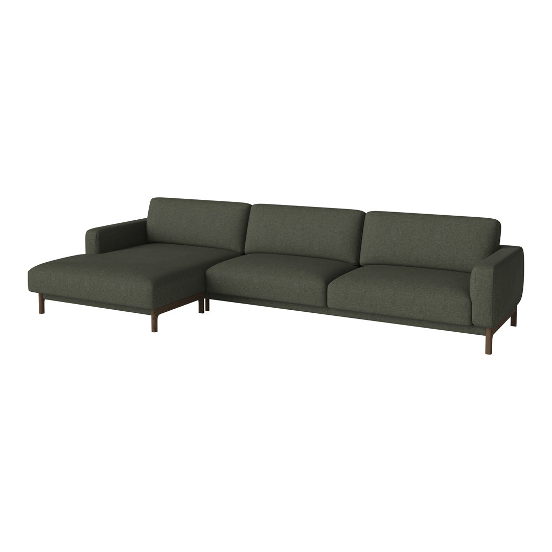 Sleek, modern sectional sofa in deep green fabric with clean lines and wooden legs.