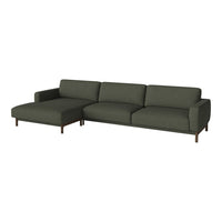 Sleek, modern sectional sofa in deep green fabric with clean lines and wooden legs.