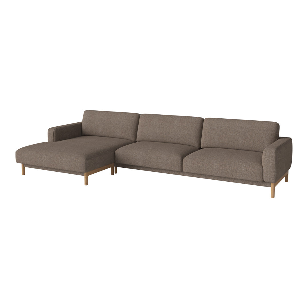 Brown upholstered sectional sofa with clean lines and a minimalist design, featuring a soft, textured fabric.