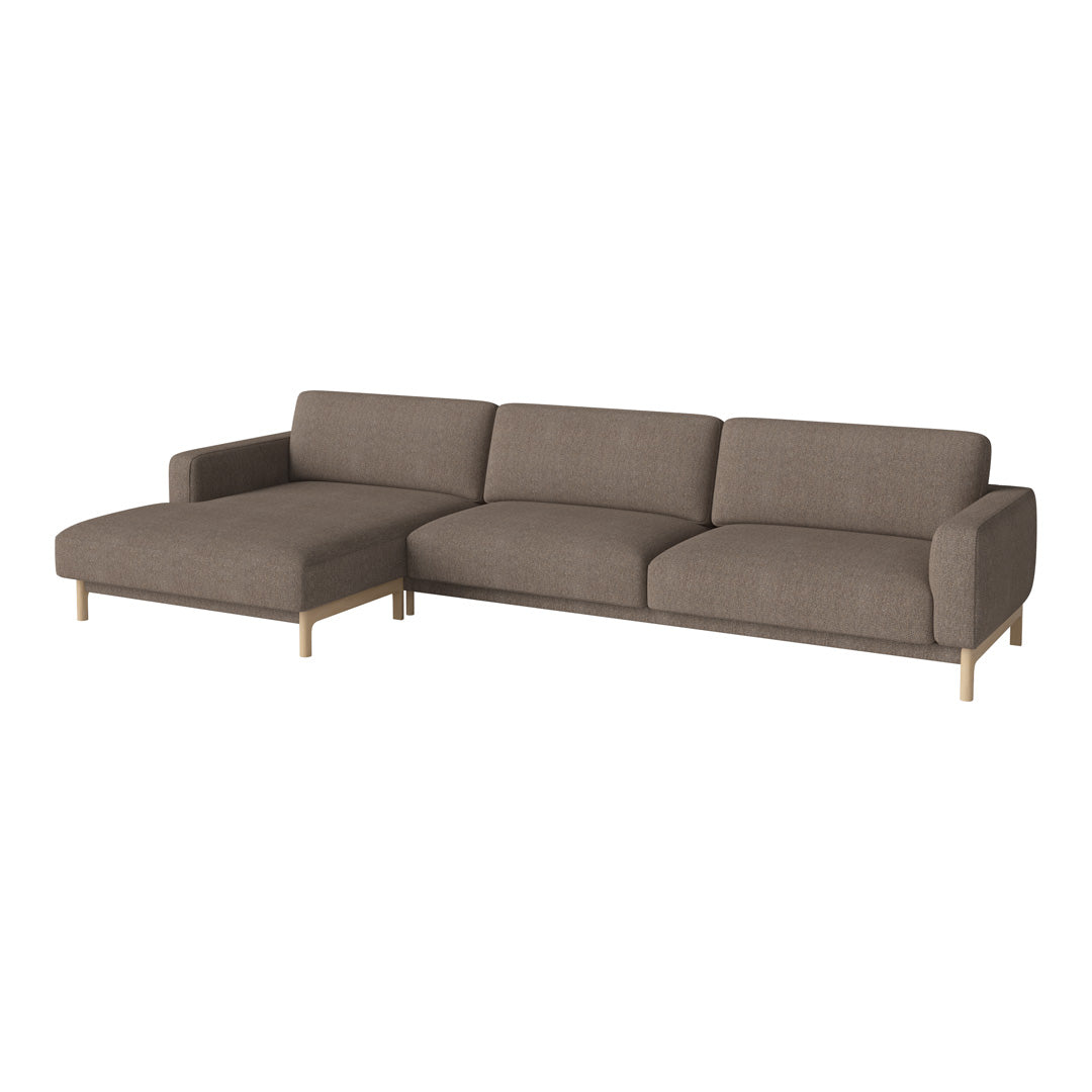 Modern sectional sofa in warm brown upholstery with smooth fabric and minimalist gold legs. Perfect for stylish living spaces.