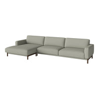Light gray fabric sectional sofa with clean lines and a minimalist design, featuring a sleek wood frame.