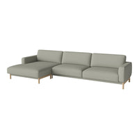 Light grey sectional sofa with clean lines and wooden legs, perfect for modern living spaces.