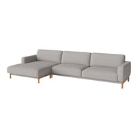 Light gray sectional sofa with clean lines and minimalist design, featuring wooden legs. Ideal for modern spaces.