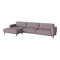 Soft lavender sofa with clean lines and smooth fabric, complemented by chic metal legs for a modern touch.