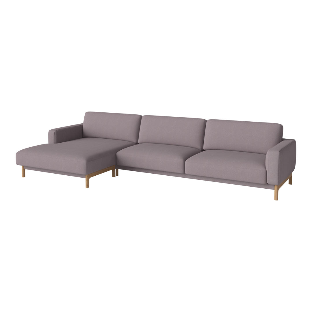 Modern sectional sofa in soft grey fabric with smooth lines and light wooden legs. Perfect for contemporary living spaces.