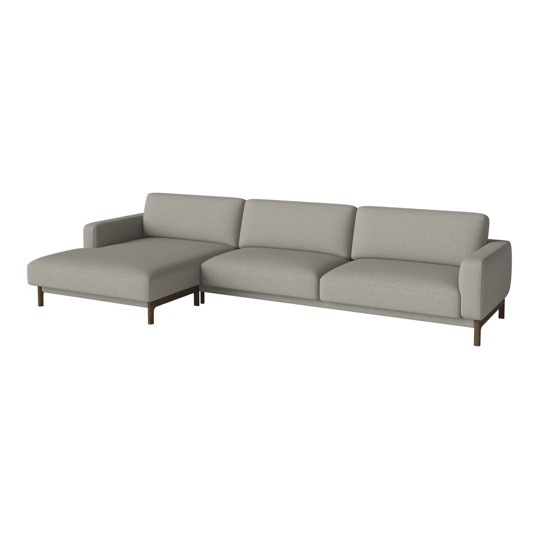 Light gray sectional sofa with minimalist design and smooth, solid fabric upholstery. Modern style with wood legs.