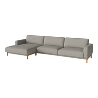Light gray modern sectional sofa with smooth upholstery and natural wood legs, perfect for contemporary interiors.