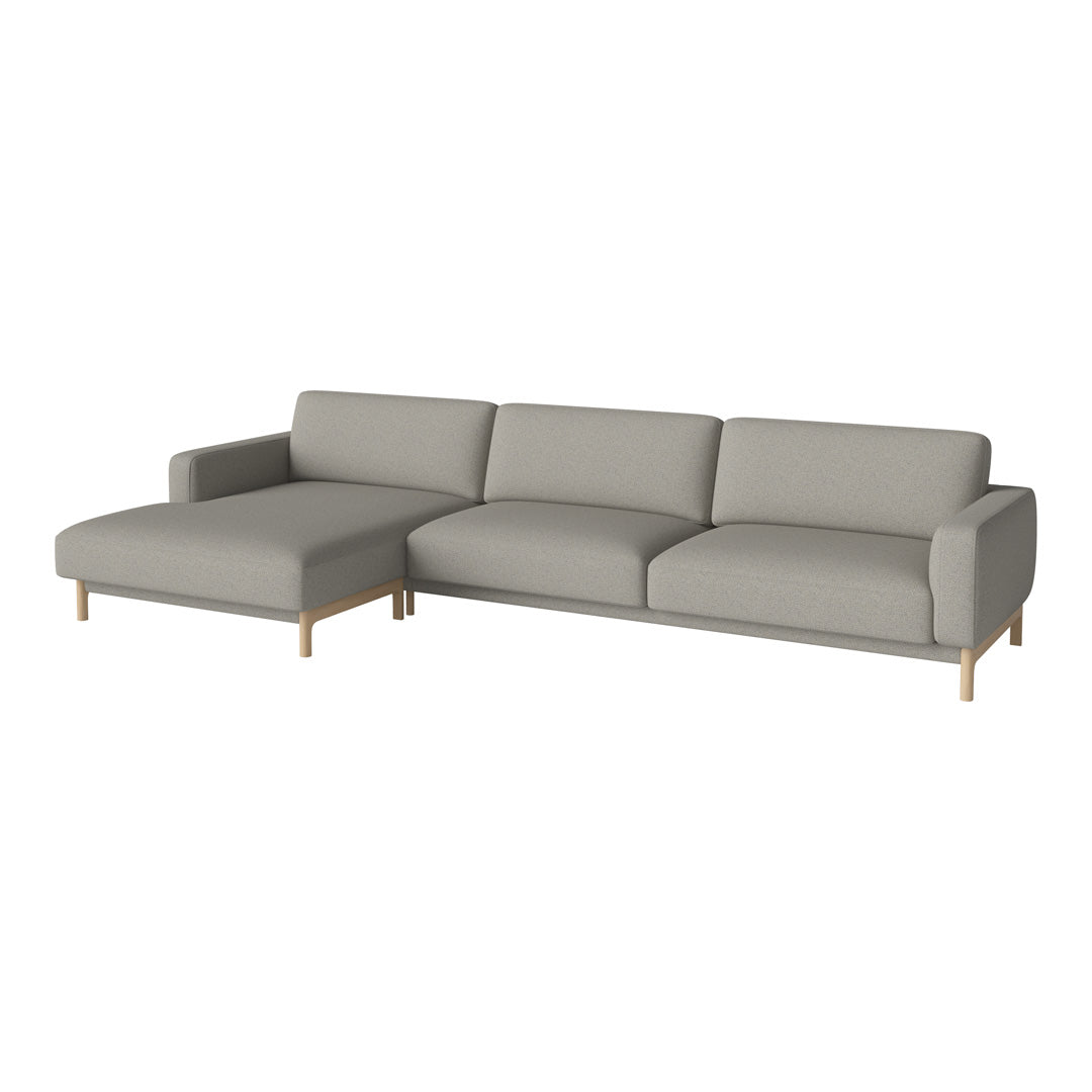Gray sectional sofa with clean lines and minimalist design, featuring a smooth fabric and light wooden legs.
