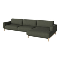 Modern dark green fabric sectional sofa with clean lines and light wood legs, perfect for contemporary living spaces.