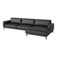 Modern black leather sectional sofa with clean lines and minimalist design, featuring a smooth, sleek finish.