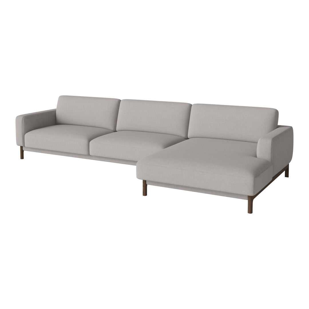 Light gray sectional sofa with a minimalist design and smooth fabric upholstery, featuring no distinct patterns.