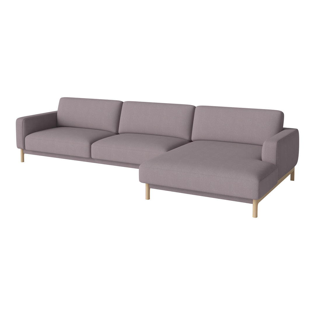"Light gray sectional sofa with minimalist design and beige wooden legs, perfect for modern living spaces."