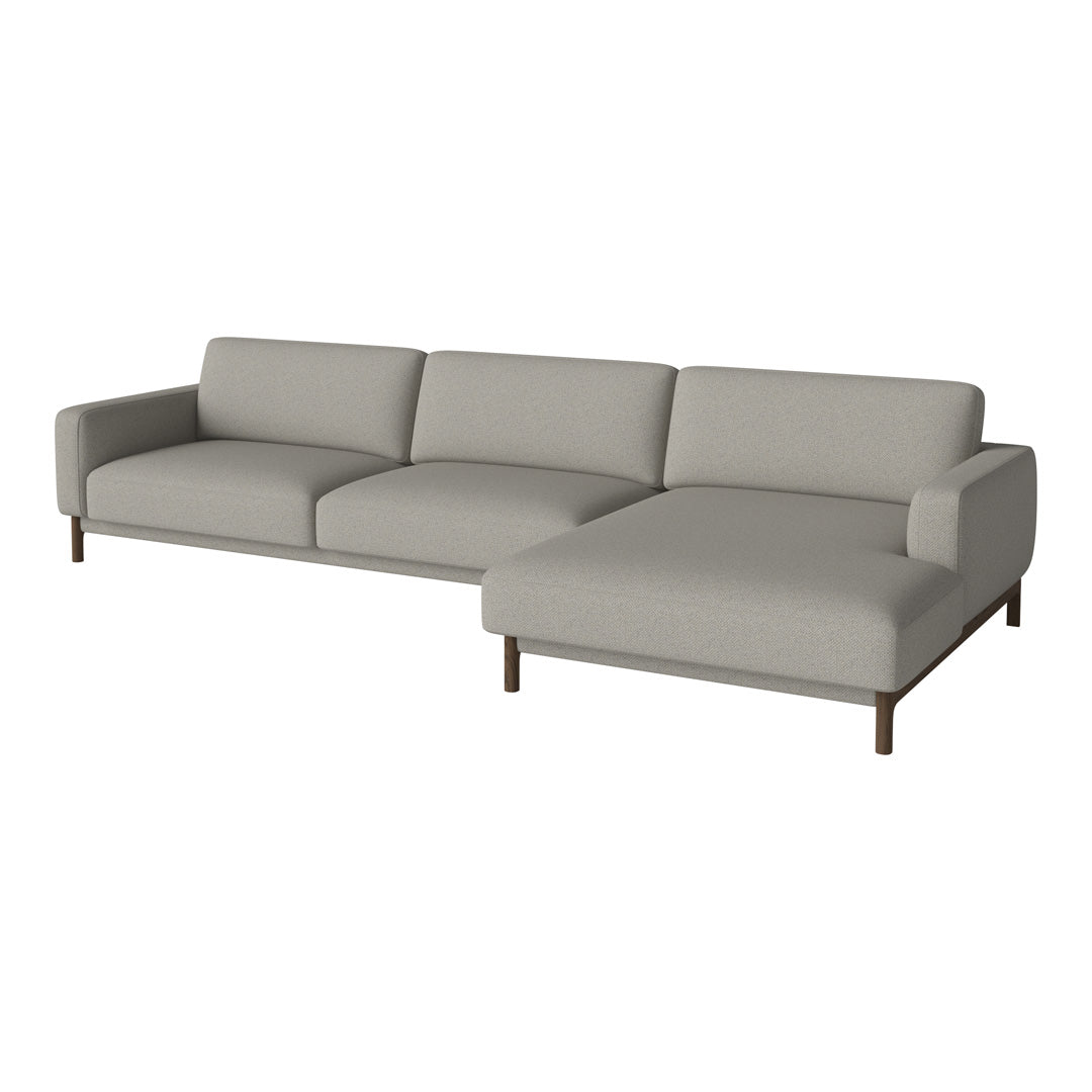 Light gray sectional sofa with clean lines and a minimalist design, featuring a solid fabric pattern.