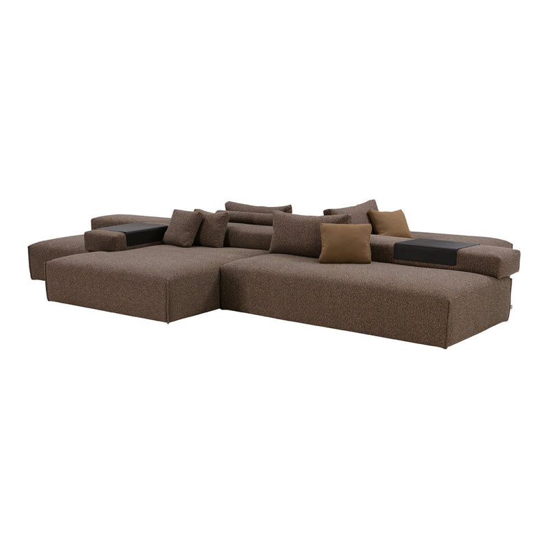 Brown sectional sofa with textured fabric and contrasting cushions in light tan and dark brown. Modern design accents.