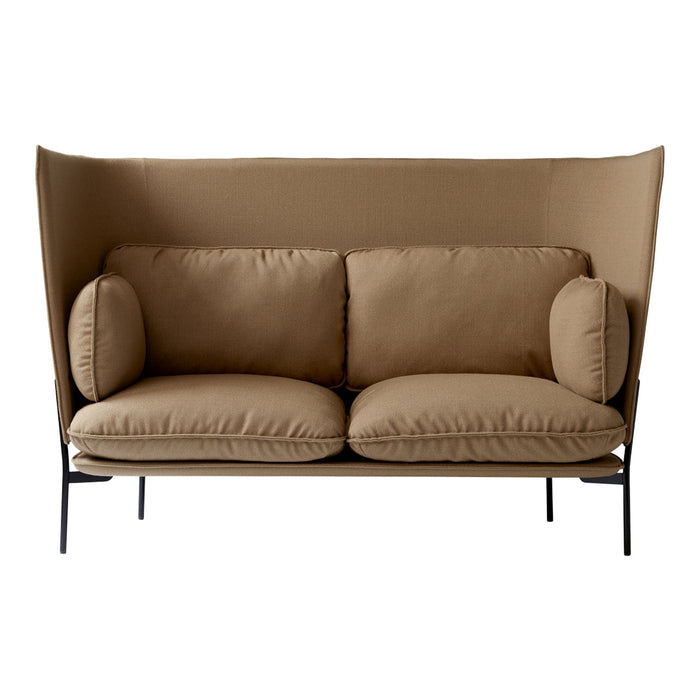 "Cozy beige sofa with plush cushions and a sleek black metal frame, featuring a minimalist design for modern decor."