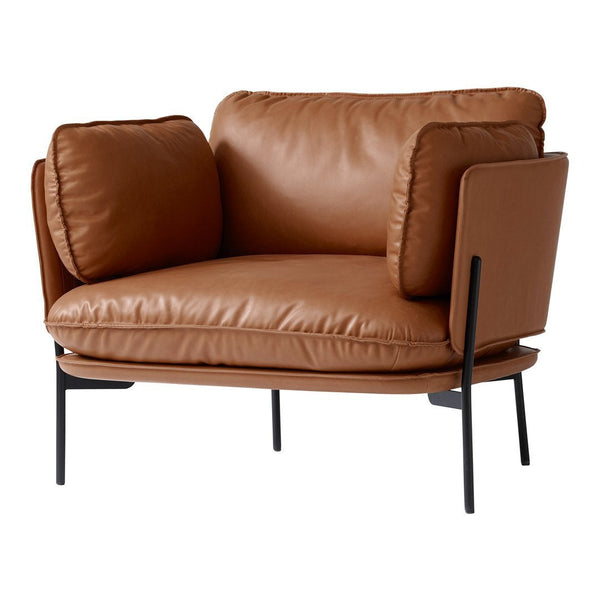 Brown leather armchair with plush cushions and minimalistic black metal frame. Modern design and cozy aesthetics.
