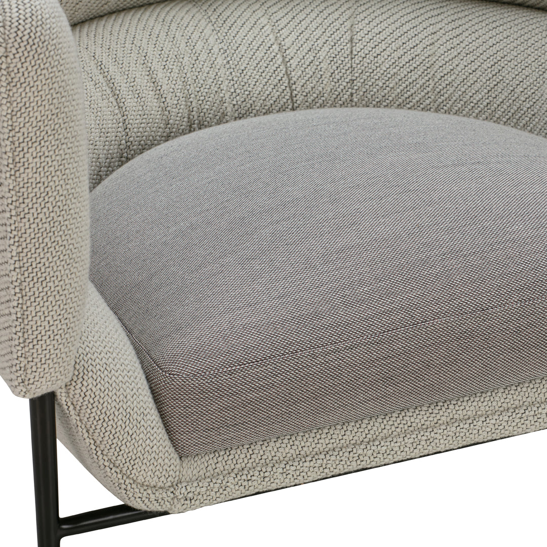 Textured gray upholstery with subtle patterns and a soft, rounded seat design. Perfect for modern interiors.
