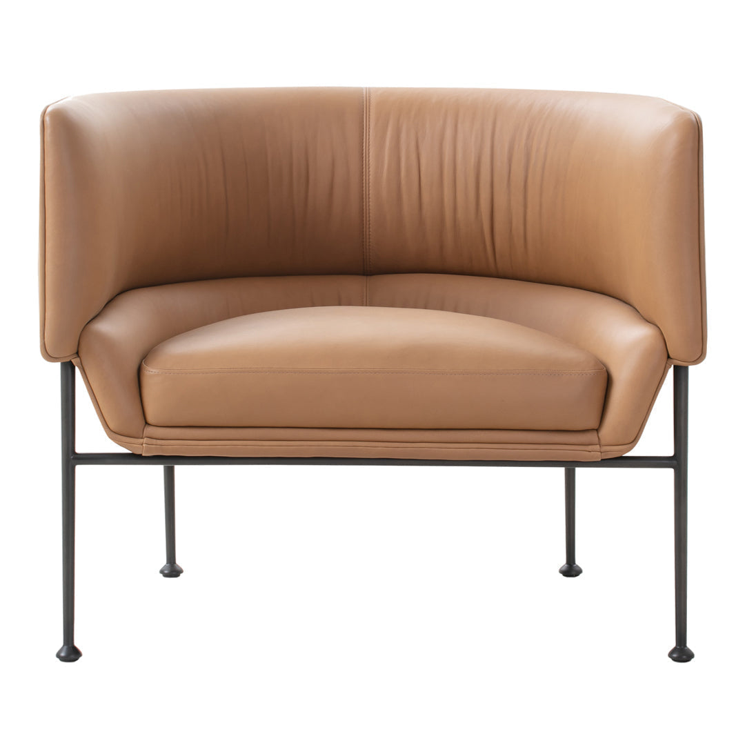 Stylish tan leather accent chair with smooth curves and sleek black metal legs, perfect for modern decor.