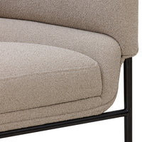 Beige textured upholstery with subtle patterns, complemented by a sleek black metal frame. Ideal for modern decor.