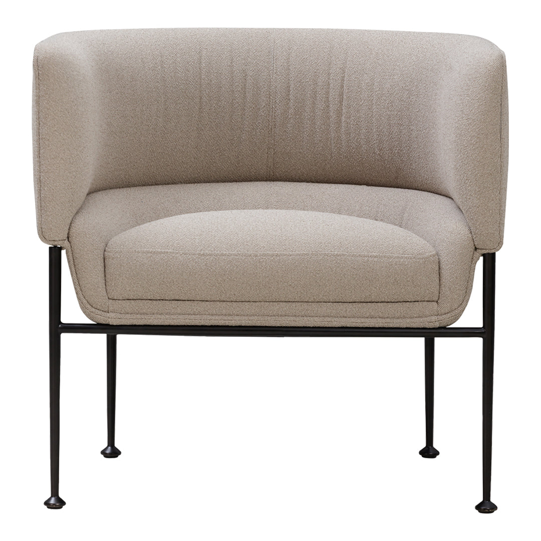 Beige upholstered chair with smooth texture and sleek black metal legs. Elegant, modern design for contemporary spaces.