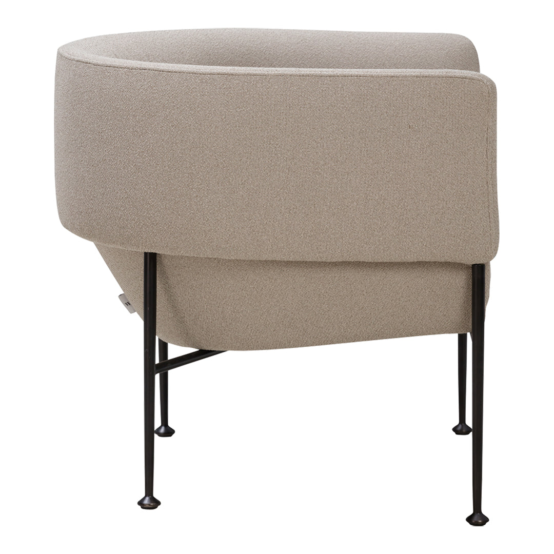 Beige upholstered chair with a smooth, curved design and sleek black metal legs. Perfect for modern decor.