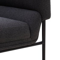 Dark gray upholstery with a subtle textured pattern, complemented by a sleek black metal frame.