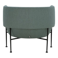 Mint green curved chair with ribbed texture and black metal legs, showcasing modern design and elegant simplicity.